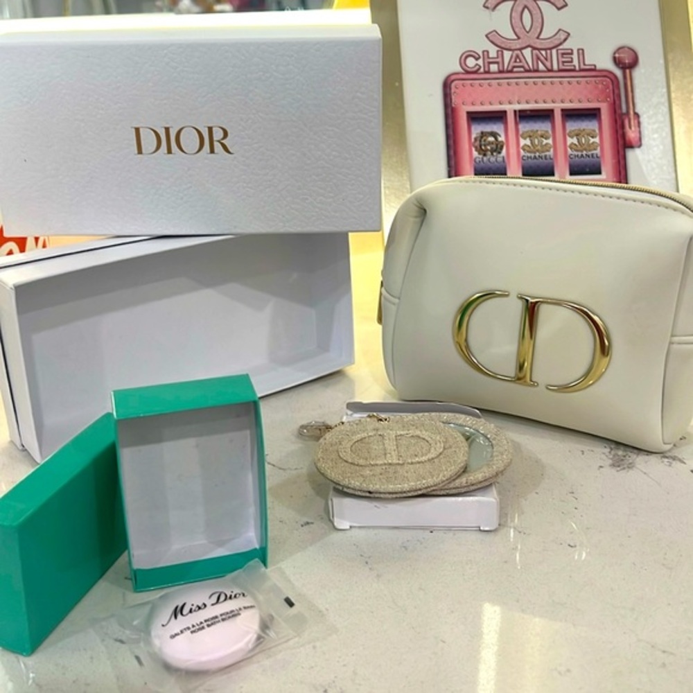 Dior makeup pouch bundle, with keychain mirror and luxurious bath bombs.